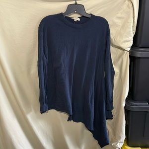 Navy sweater with shark tail on one side